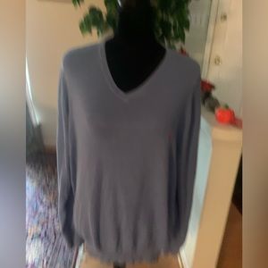 Periwinkle Pima cotton
Ralph Lauren sweater polo player is
pink. Size XL